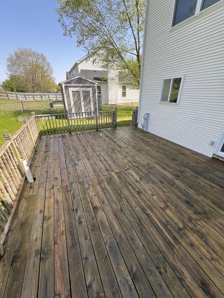 Wood deck freshly stripped and cleaned, ready for sealing