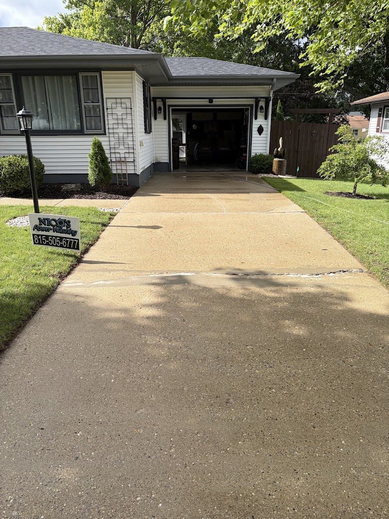Concrete driveway washed back to an even, bright finish